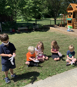 Students conducting science experiment with potatoes