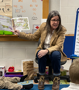 Superintendent Stanton reading to kindergarten students